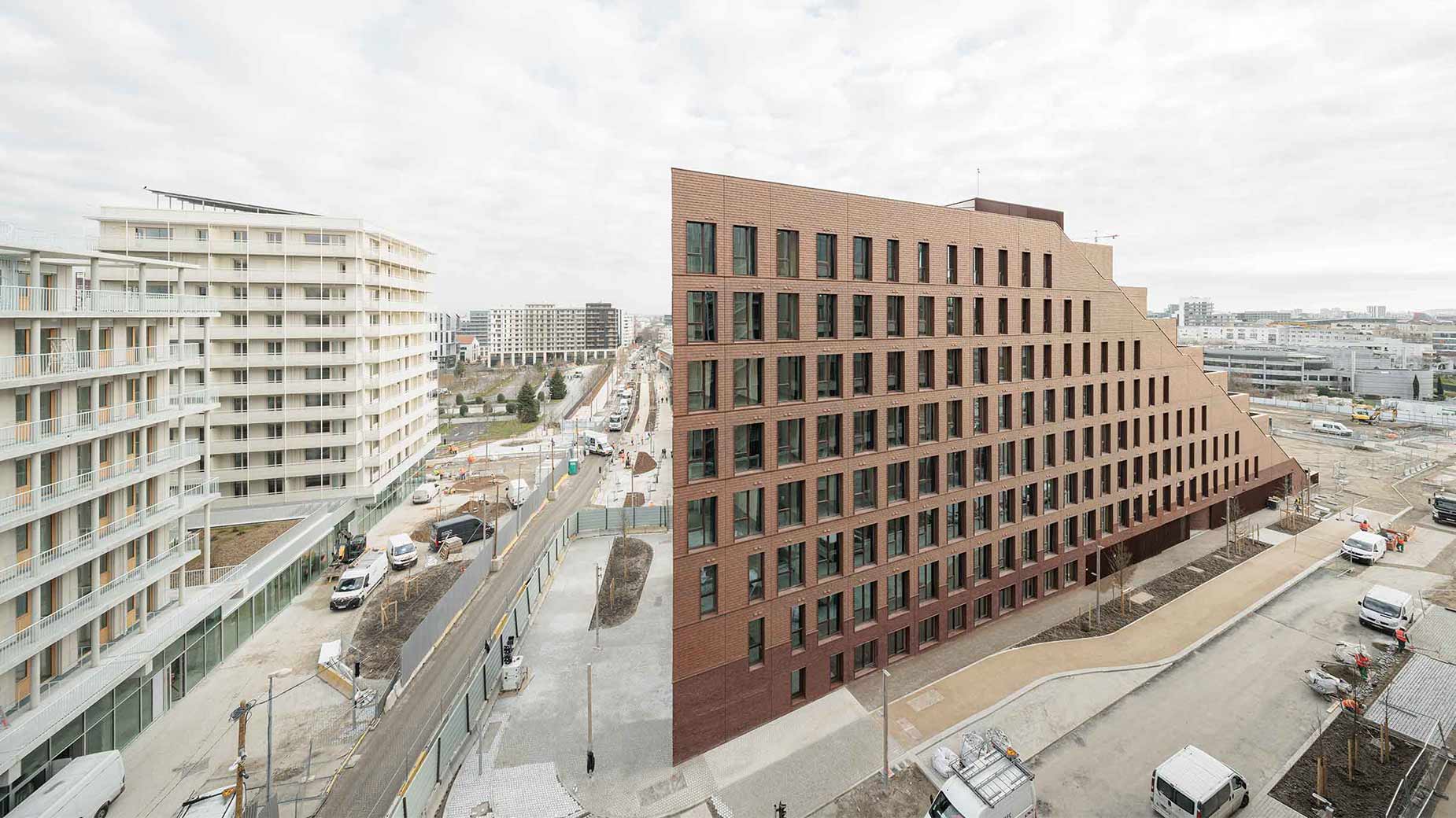 Au coeur du Village des Athlètes, Les Gradins, logements réversibles bureaux